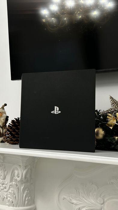 PlayStation 4 Pro - 1TB - 4 jocuri CD