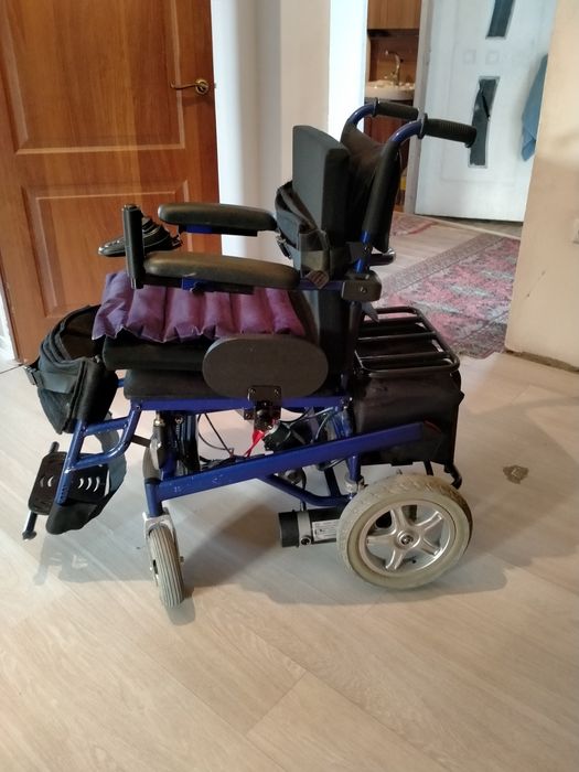 Электрическая инвалидная коляска