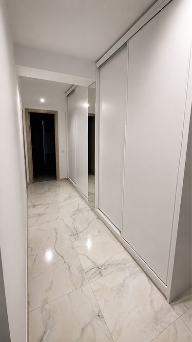 Inchiriez apartament 2 camere ,58mp + gradina 100mp