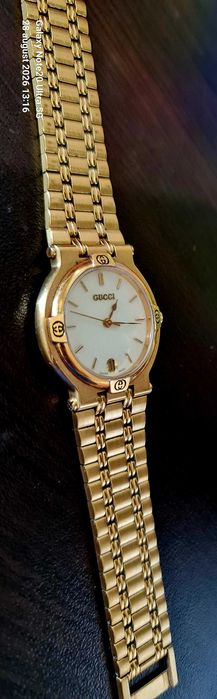 GUCCI ceas unisex vintage , damă in stare foarte buna , placat cu aur