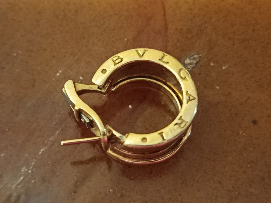 Золотая серьга Bvlgari 750 пробы
