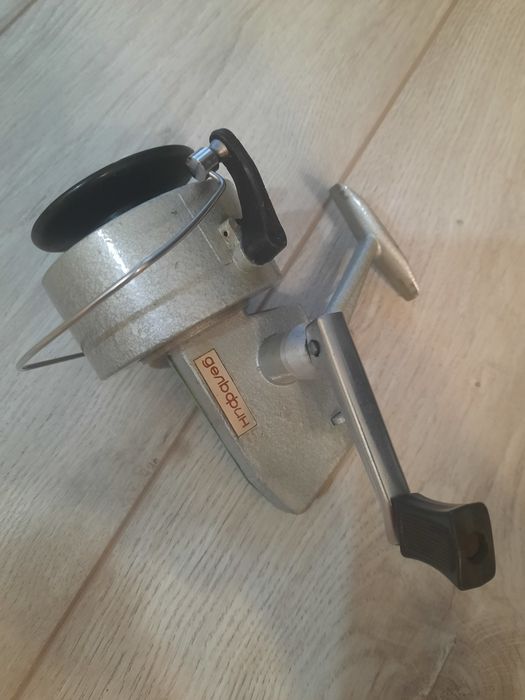 Катушка спиннинговая дельфин