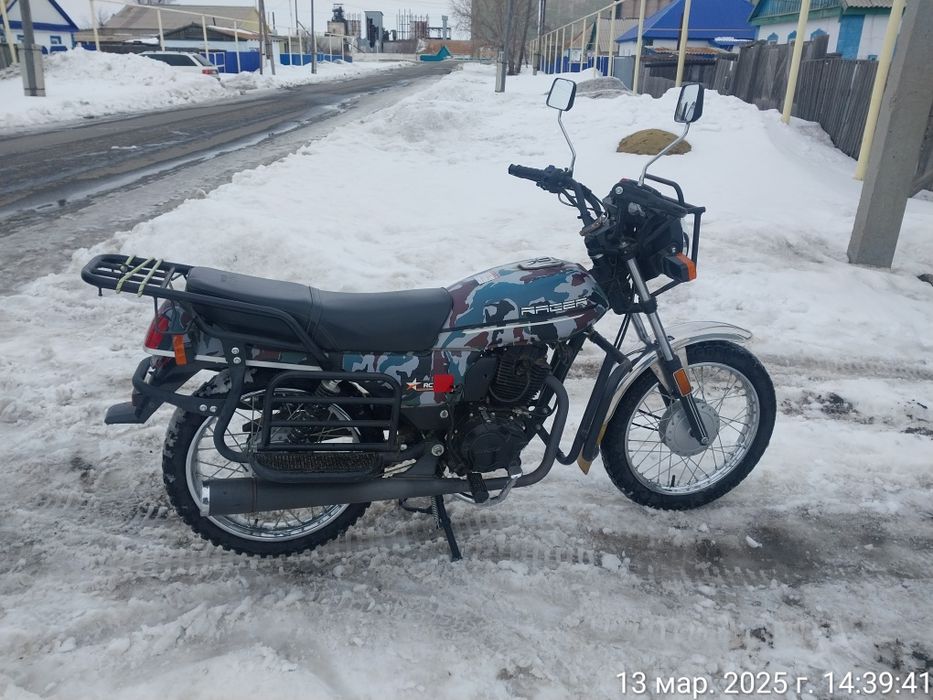 Мотоцикл раисер.