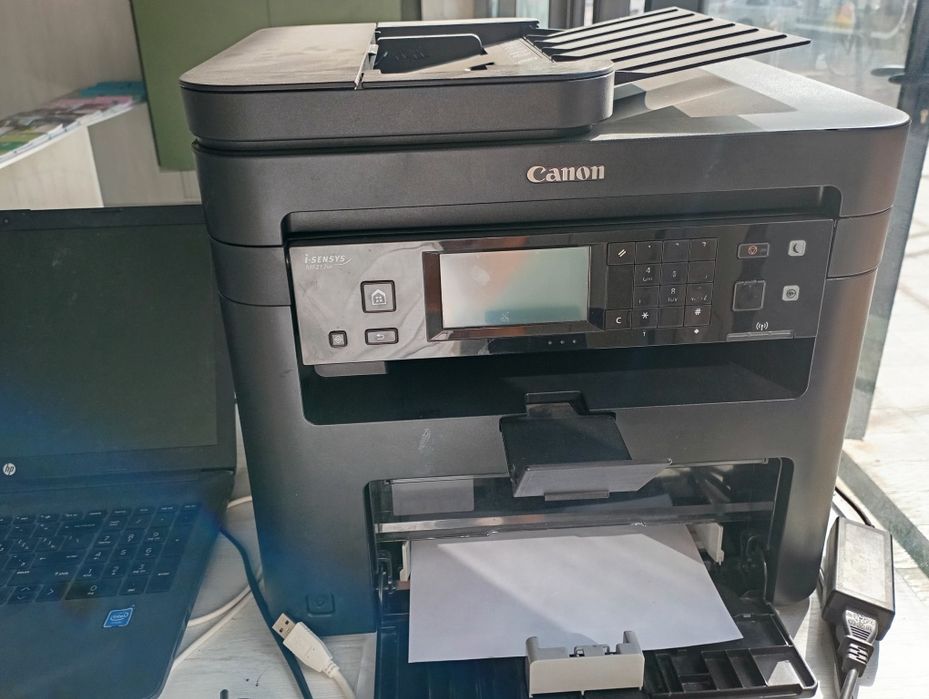 Canon MF217W oq qora skaner qiladi