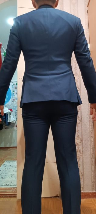 Продам костюм с брюками.