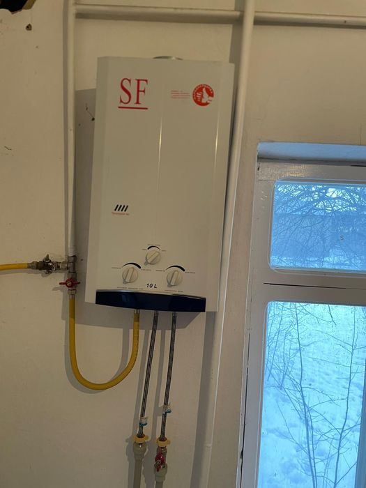 Продаётся газовая колонка марка  SF бу.