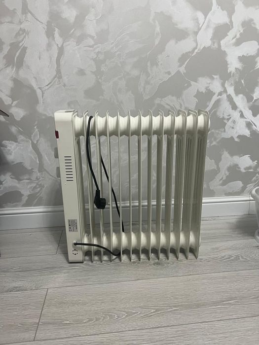 Масляный обогреватель.