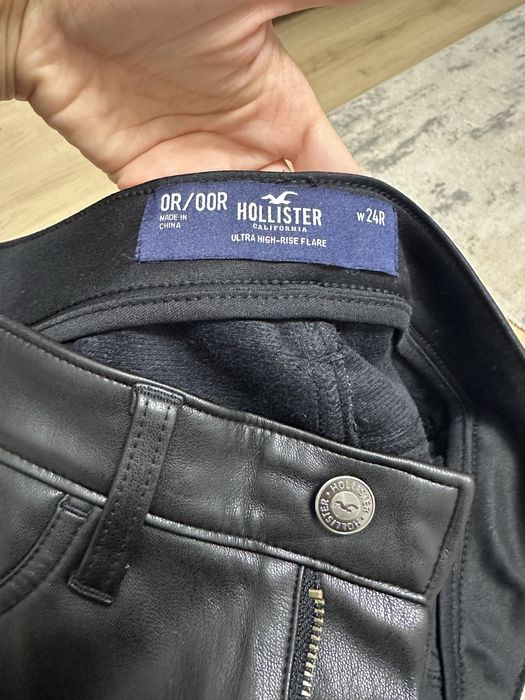 Pantaloni negri din piele