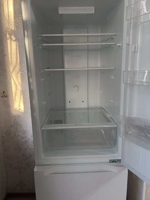 Новый холодильник.