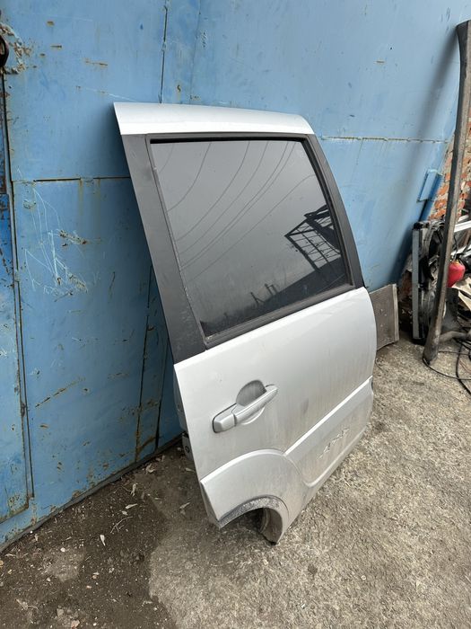 Дверь нива шевроле бертоне