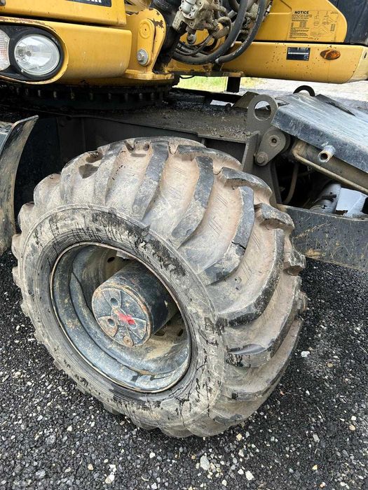 Excavator pe roti CAT M313D