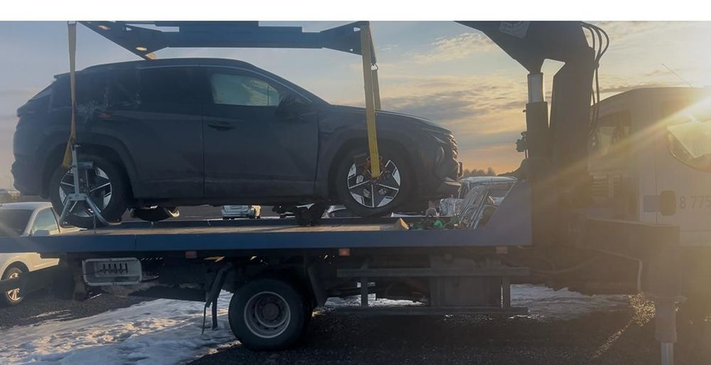 Эвакуатор с краном