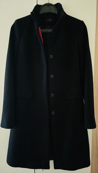 Вталено вълнено палто