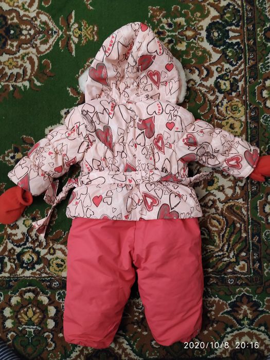 Продам зимний комбинезон для девочки