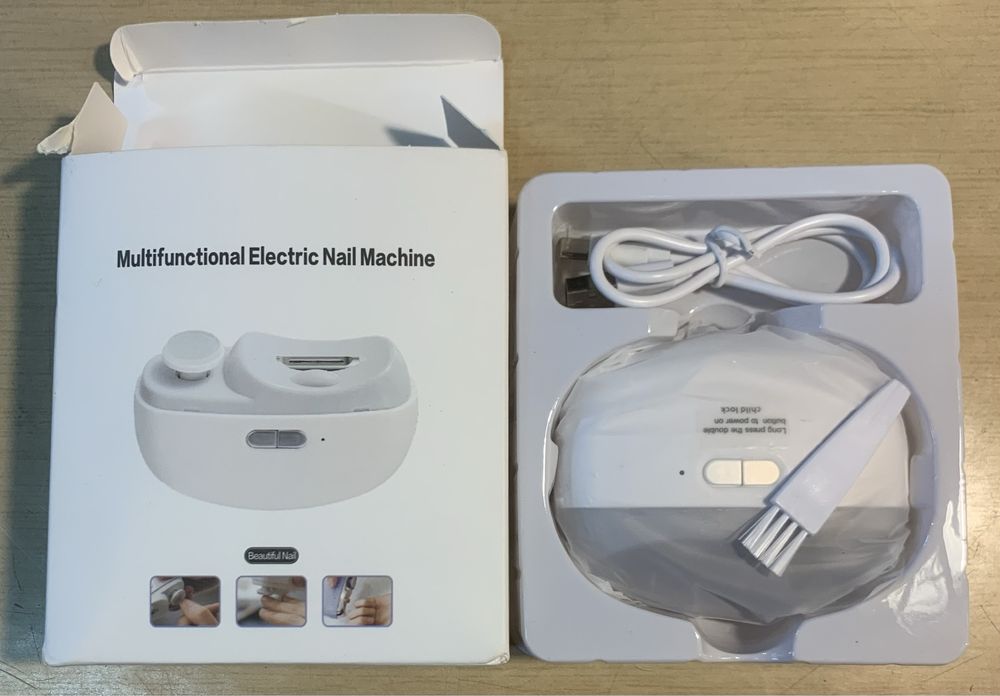 Aparat electric pentru tāiat, pilit si lustruit unghiile