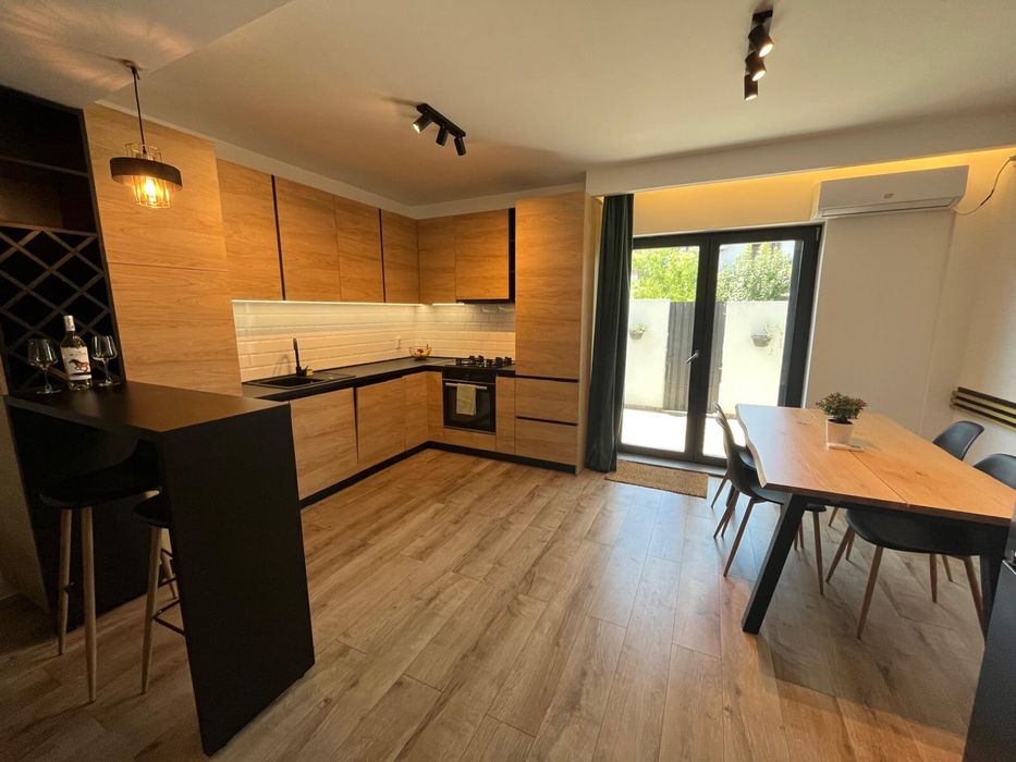 Apartament nou 3 camere și gradină, pe două nivele si parcare inclusă