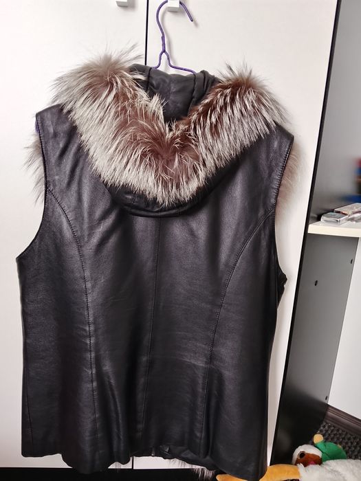 Продам жилет меховой