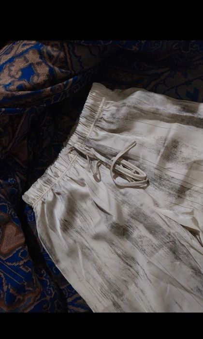 Pantaloni evazați/largi