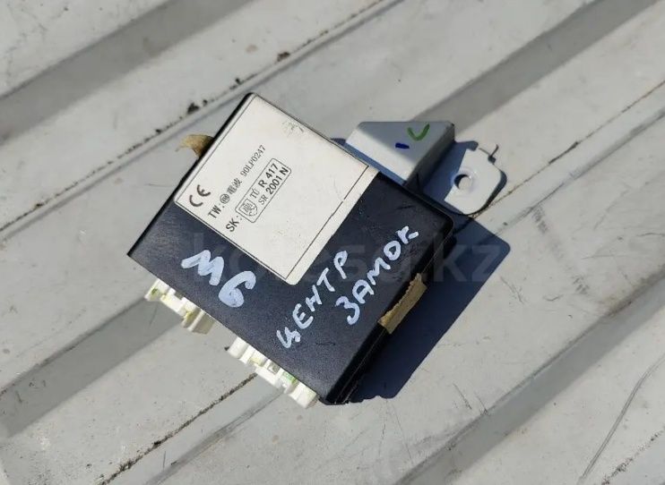 Блок центр замка Мазда 6 Mazda