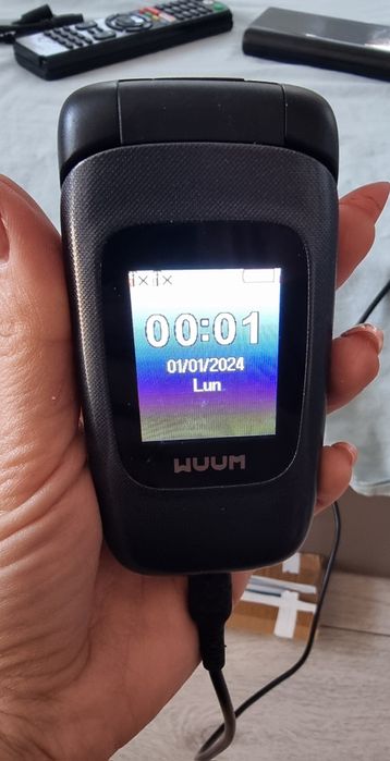 Телефон с копчета  Wuun