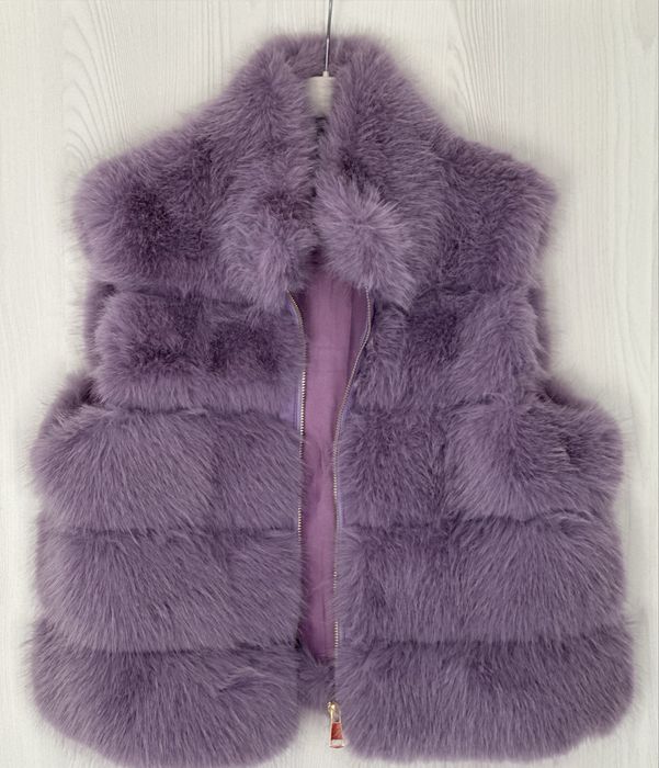 Пухкав дамски елек