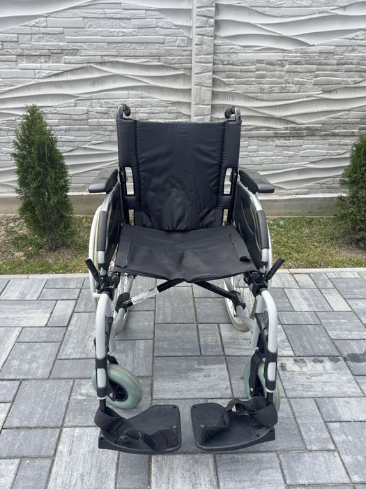 Carucior handicap pliabil