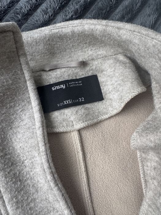 Чисто ново късо палто