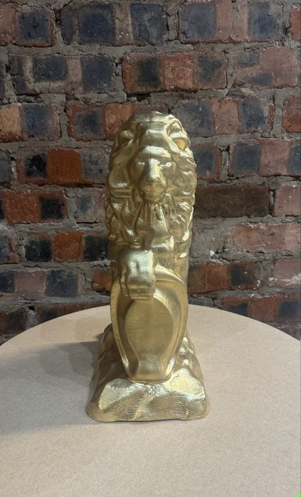 Статуи из гипса львы