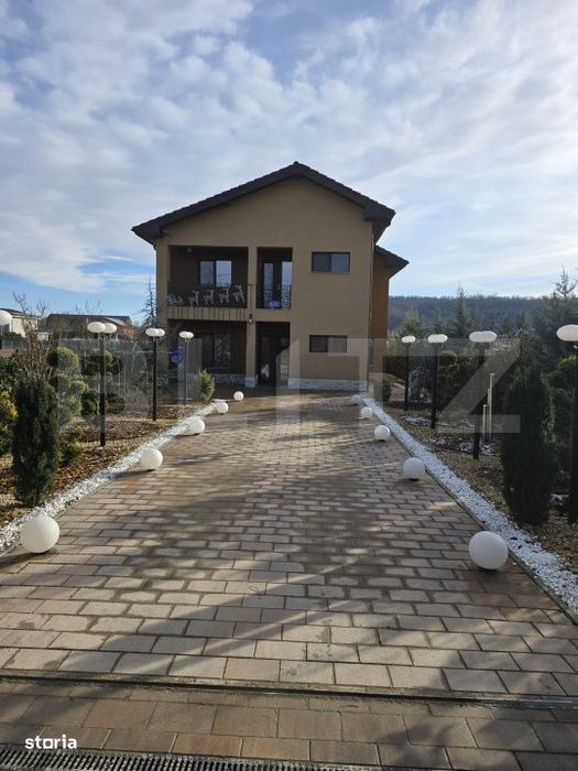 Casa P+1E, 4 dormitoare, teren 590 mp, zona Leamna de Jos