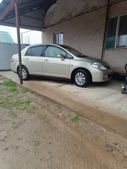 Ниссан тиида 1,5 литр.