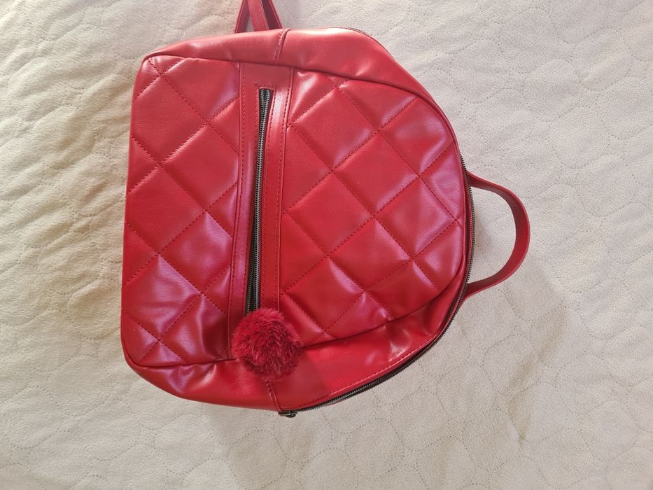 Vând ghiozdanel elegant