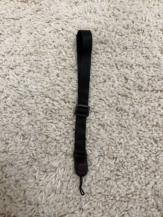 Curea de incheietura cu eliberare rapida pentru camera