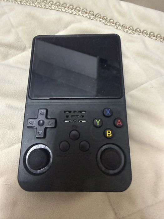Портативная игровая консоль R36S