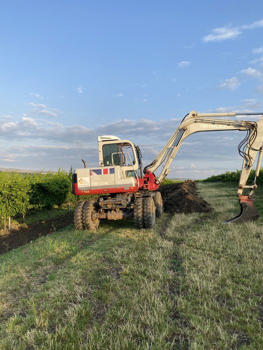 Excavator pe roti Tackeucki impecabil !!