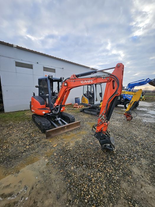 Miniexcavator powertilt
