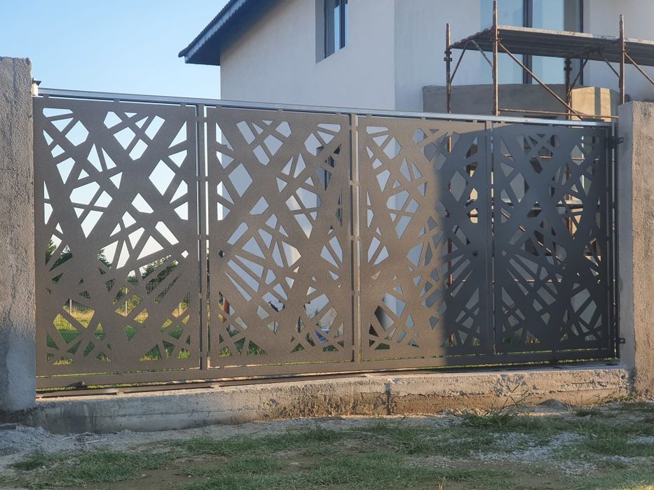 Porți, panouri gard, balustrade din tabla debitata cu plasma cnc
