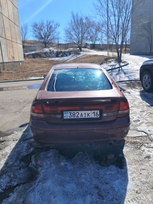 Продам мазда кронос
