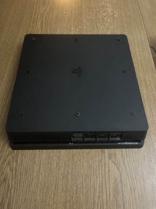 PS4 Slim + 2 manete + 9 jocuri