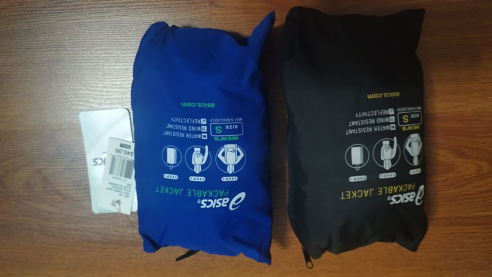 Две куртки ветровки новые,