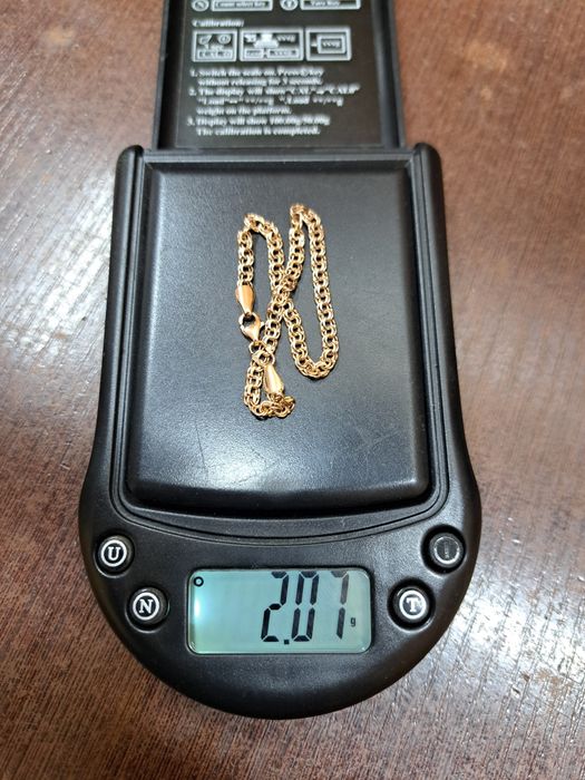 Продам новый золотой браслет