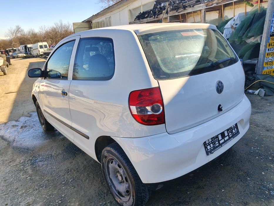 Piese motor cutie viteze pompa servo direcție  ușa haion bara pompa caseta alternator baie ulei chiuloasă catalizator arcuri fuzeta punte vw fox 1.2