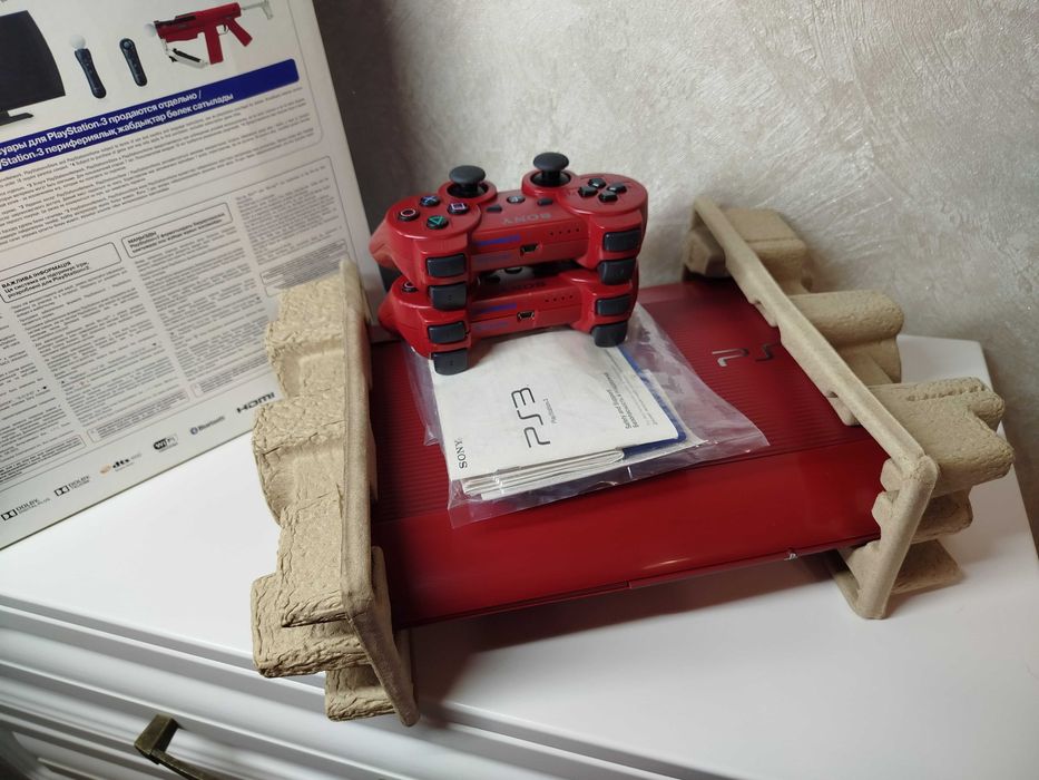 Sony Playstation 3 в коробке с документами