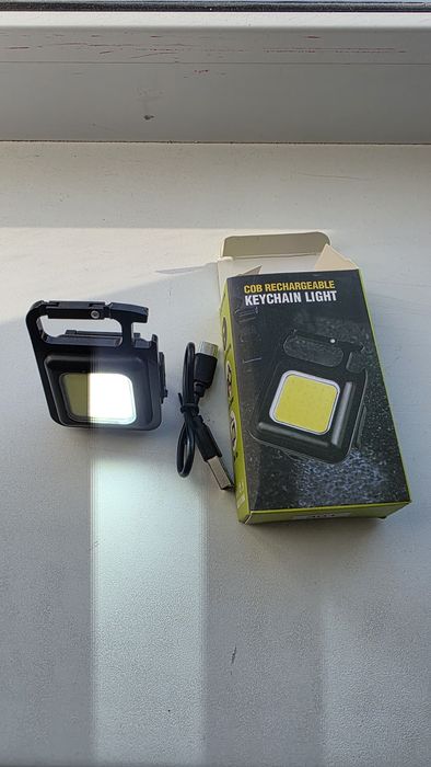 Фонарь брелок новый.
