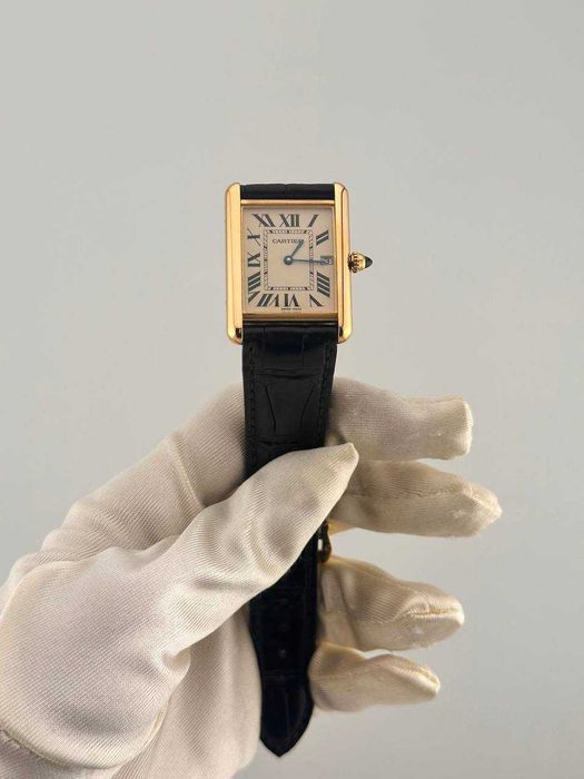 Cartier Tank золотые