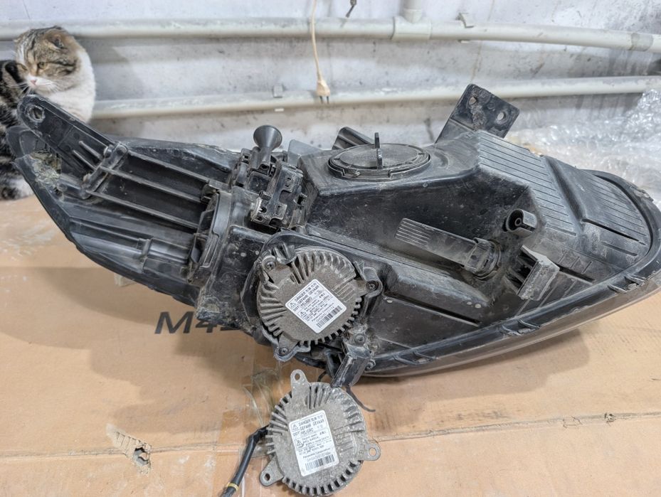 Фара левая Киа Каренс