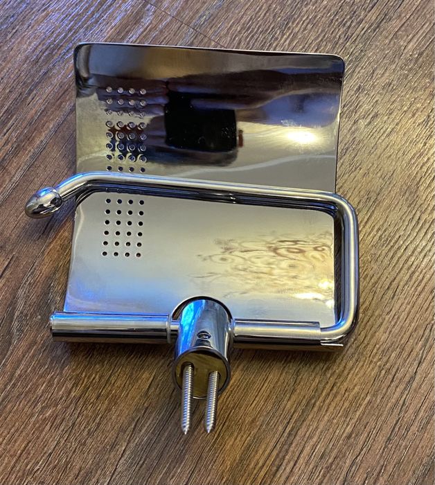 Держатель туалетной бумаги.