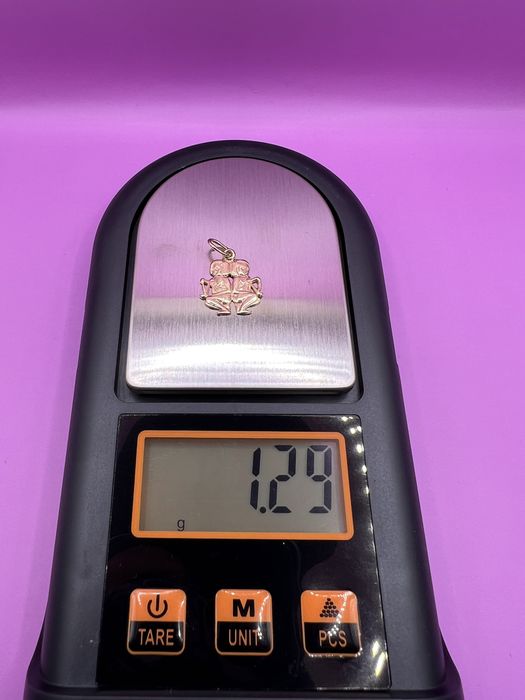 Продам золотой кулон.