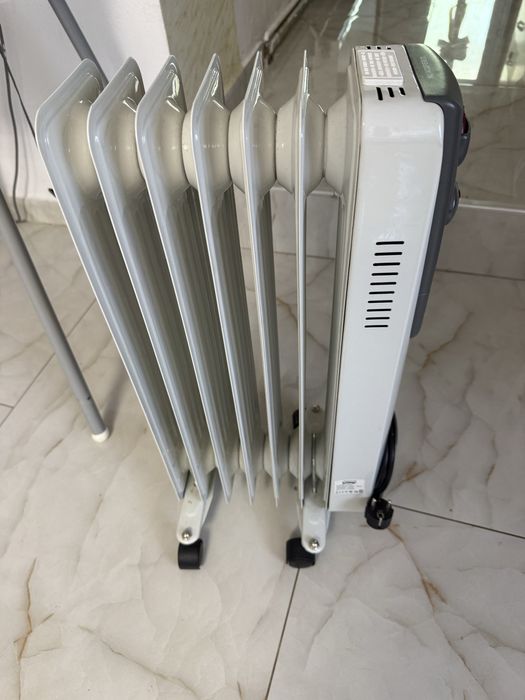 Titlu: Calorifer electric cu ulei Victronic OFR-7, 1500W, 7 elemenți