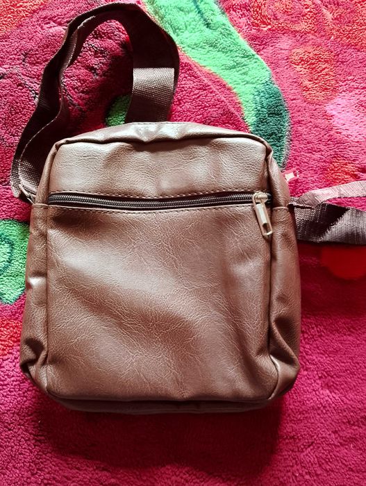 Барсетка новая...