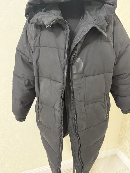 Женский пуховик.